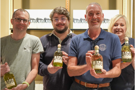 Our team at Lagg Distillery with the Lagg Kilmory Single Malt. 