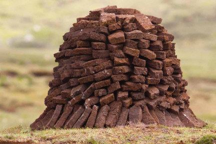 Peat cutters use shovels which cut down through layers of bog and cut out large ‘bricks’ of peat, which are then left in stacks to dry.